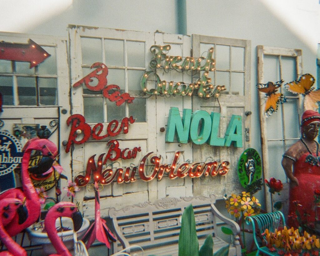 Bright, professional storefront of a modern small business standing out on a classic New Orleans street.
