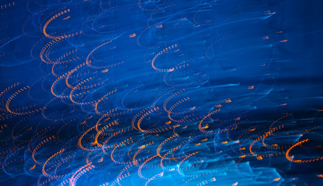 Abstract blue light trails flowing smoothly in a modern, dark environment, representing a zero-friction data pipeline for lead generation.