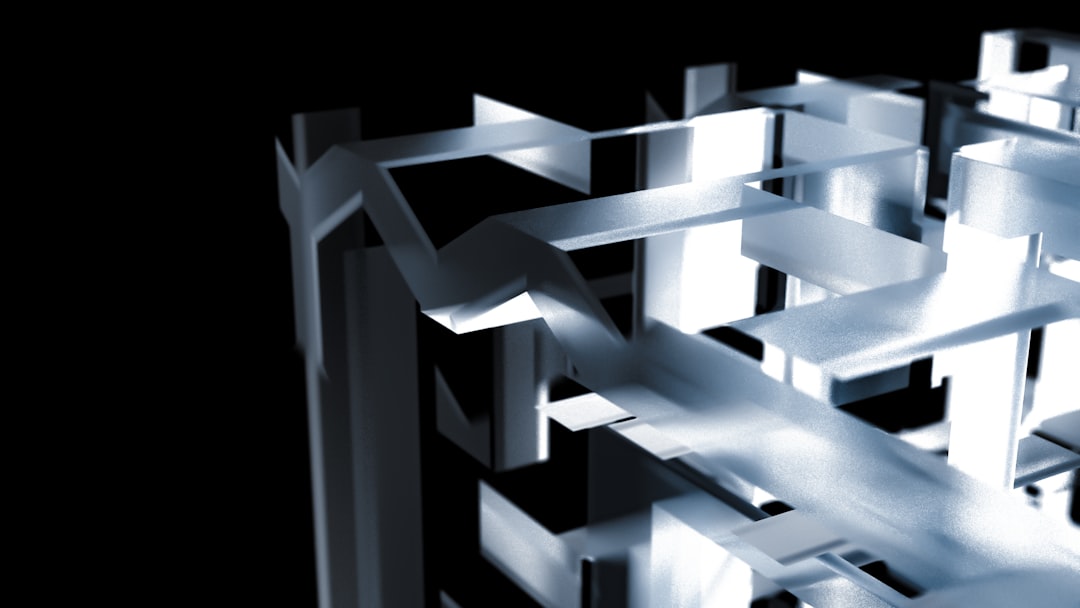 An aerial view of a complex and intricate modern maze with clean lines, symbolizing the challenge of navigating technical friction to find a clear path.