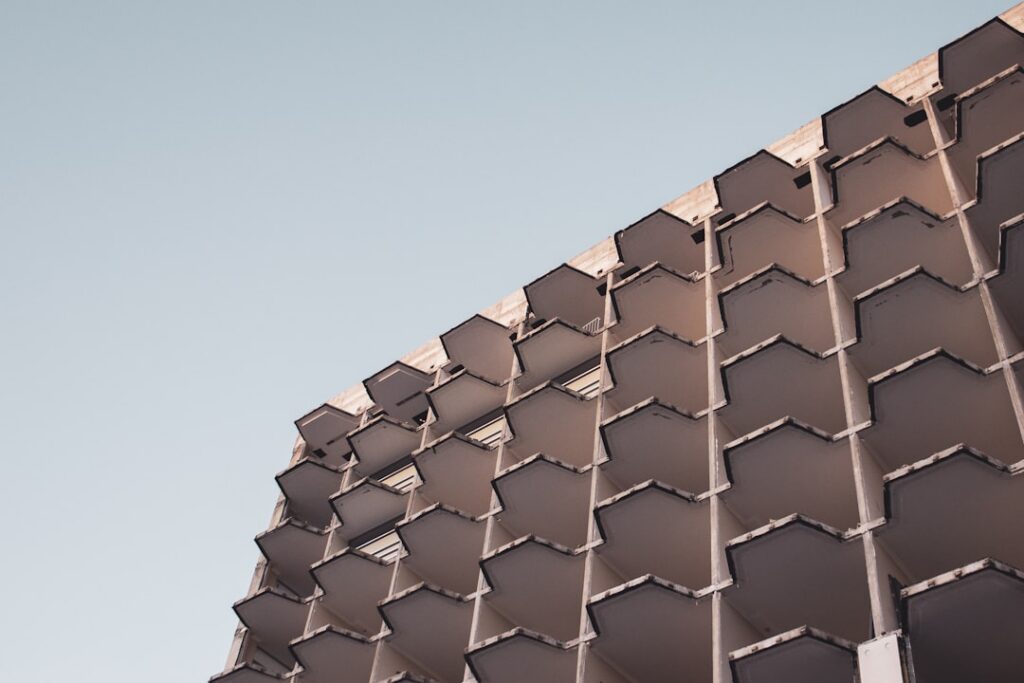 Close-up of precisely interlocking geometric concrete blocks, representing a strong and immutable foundation for a modern ...
