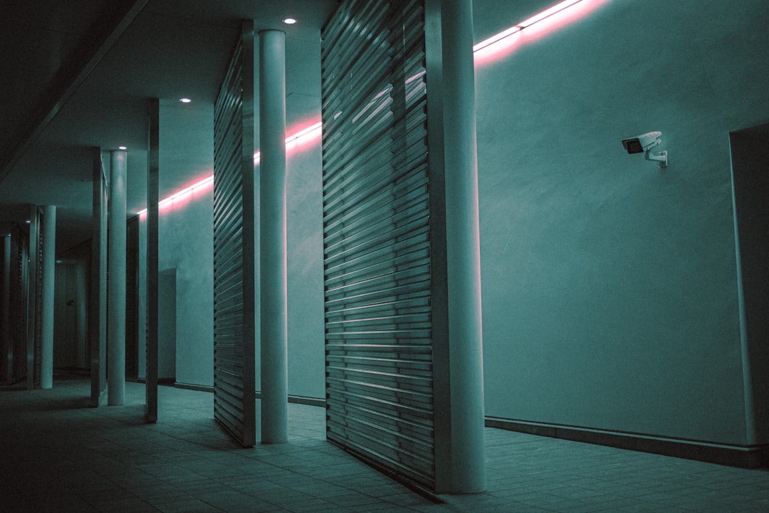 A perfectly organized server rack in a modern data center, illuminated by a clean blue light, representing a well-built infrastructure for data integrity and AI.