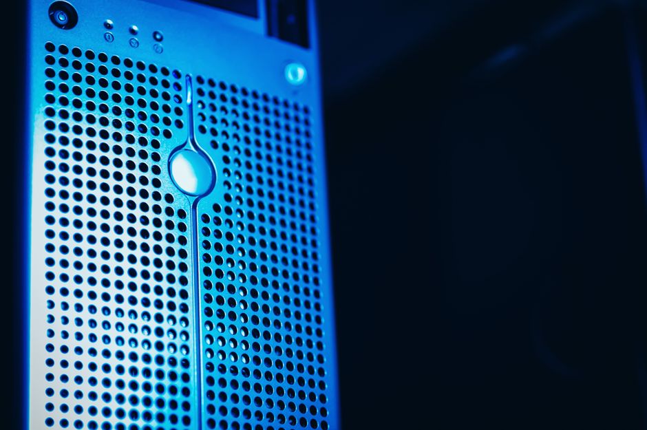 A close-up shot of a server rack with meticulously organized network cables, glowing with a cool blue light, representing ordered data intelligence.