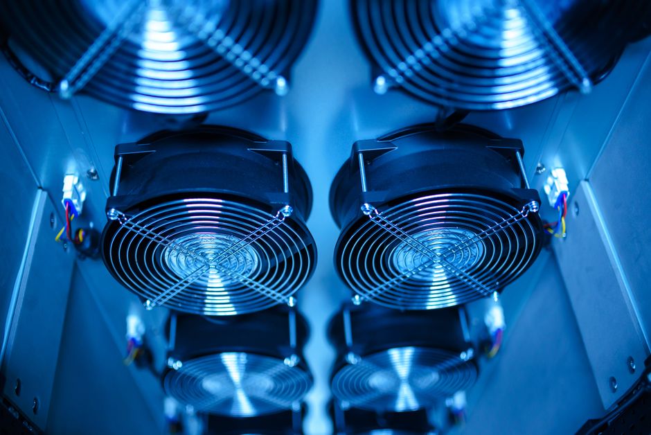 A bright, clean, and modern data center aisle with neatly organized server racks, symbolizing a CTO's protocol for creating a structured, canonical source of truth.