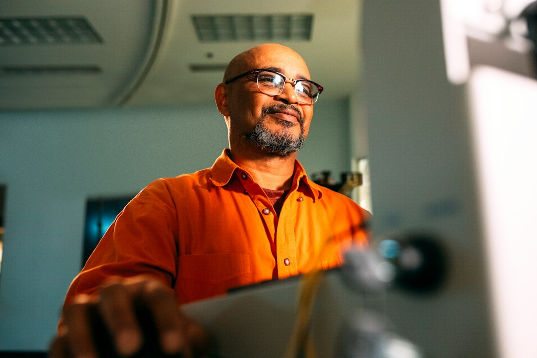 A professional engineer in a data center carefully inspects a server rack, representing a CTO's hands-on protocol for technical SEO.